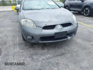 2006 Mitsubishi Eclipse GT with VIN 4A3AK34T86E048617, listed as a IAAI auction lot 42166851 with 128,716 mi miles. Bid and sale history available at carsss.com. Image 6.