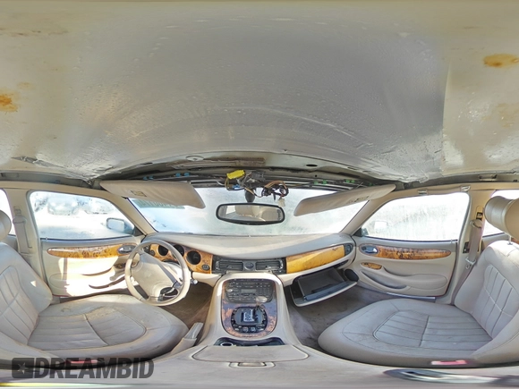 1998 Jaguar XJ with VIN SAJHX1245WC819762, listed as a Copart auction lot 81480174 with 132,491 mi miles and Salvage title. Bid and sale history available at DreamBid. Image 13.
