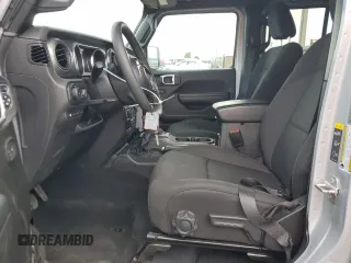 2023 Jeep Wrangler z VIN 1C4JJXN64PW630179, wystawiony jako Copart lot #53879415 z przebiegiem 27 905 mil mil oraz Czysty tytuł • Clean title. Historia ofert i sprzedaży dostępna na DreamBid. Obrazek 7.