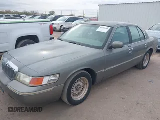 2002 Mercury Grand Marquis LS Premium с VIN 2MEFM75WX2X659825, выставлен на аукционе IAAI как лот 41718654 с пробегом 141 127 миль миль и . История ставок и продаж доступна на DreamBid. Изображение 2.