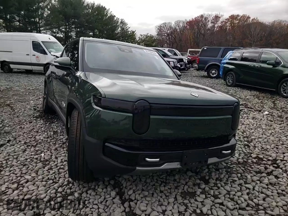 2024 Rivian R1T Adventure z VIN 7FCTGCAA1RN030829, wystawiony jako Copart lot #81459854 z przebiegiem Nie podano mil oraz Szkody całkowita. Historia ofert i sprzedaży dostępna na DreamBid. Obrazek 12.