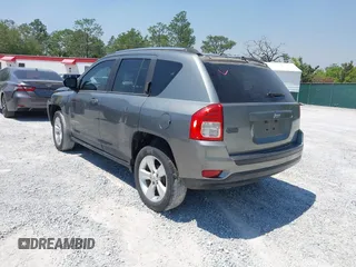 2012 Jeep Compass Sport with VIN 1C4NJCBB9CD610317, listed as a IAAI auction lot 42049138 with 127,616 mi miles and . Bid and sale history available at carsss.com. Image 3.