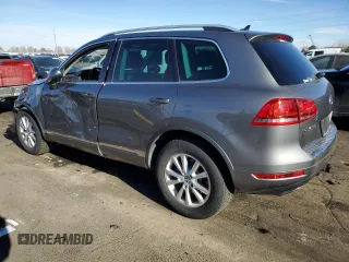 2012 Volkswagen Touareg Lux z VIN WVGEK9BPXCD011322, wystawiony jako Copart lot #87062254 z przebiegiem 110 985 mil mil oraz Szkoda całkowita • Salvage title. Historia ofert i sprzedaży dostępna na DreamBid. Obrazek 2.