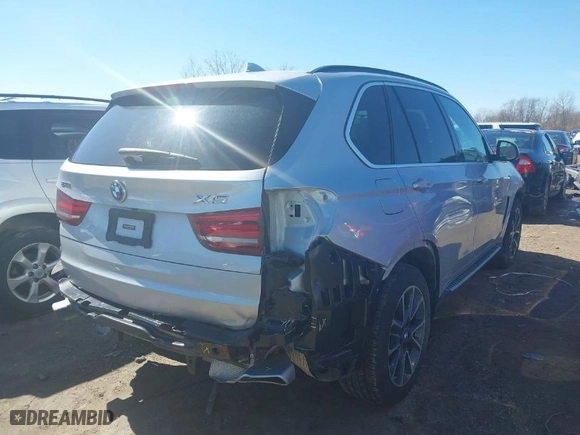 2016 BMW X5 eDrive xDrive40e with VIN 5UXKT0C58G0S76927, listed as a IAAI auction lot 41642438 with 78,312 mi miles. Bid and sale history available at carsss.com. Image 4.