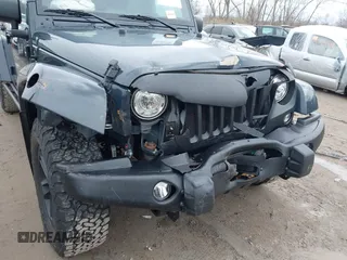 2017 Jeep Wrangler Unlimited Sahara with VIN 1C4BJWEG3HL569143, listed as a IAAI auction lot 41986188 with 27,495 mi miles. Bid and sale history available at carsss.com. Image 6.