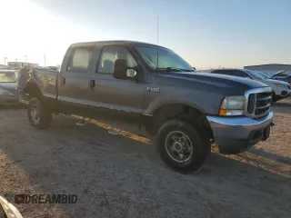 2002 Ford F-250 XL with VIN 3FTNW21F42MA14308, listed as a Copart auction lot 48522435 with 459,947 mi miles and Salvage title. Bid and sale history available at DreamBid. Image 4.