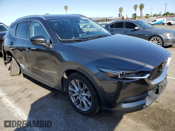 2019 Mazda CX-5 Grand Touring with VIN JM3KFADM2K0665356, listed as a Copart auction lot 51886685 with 44,760 mi miles and Salvage Title. Bid and sale history available at carsss.com. Image 4.