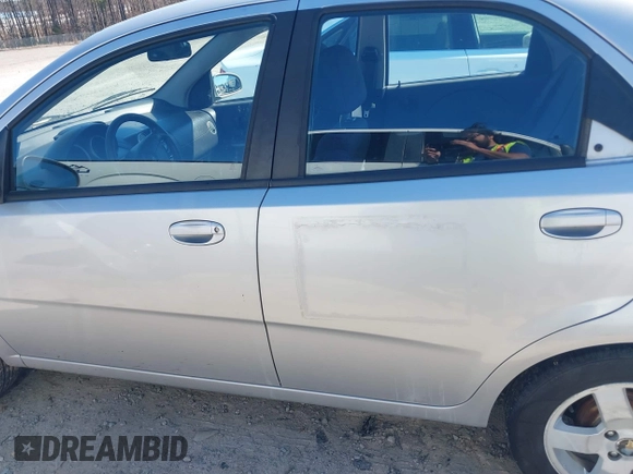 2006 Chevrolet Aveo LT z VIN KL1TG56656B636788, wystawiony jako IAAI lot #41771944 z przebiegiem 140 169 mil mil oraz . Historia ofert i sprzedaży dostępna na DreamBid. Obrazek 14.
