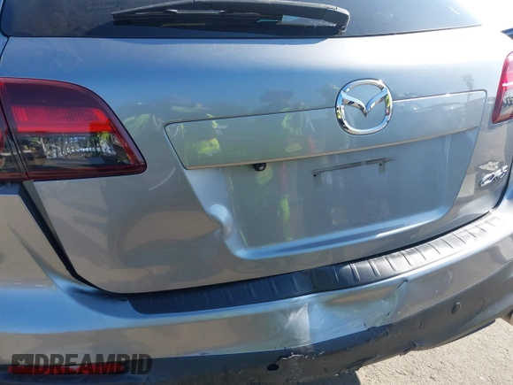 2013 Mazda CX-9 Touring z VIN JM3TB2CVXD0416533, wystawiony jako IAAI lot #42223034 z przebiegiem 135 990 mil mil oraz . Historia ofert i sprzedaży dostępna na DreamBid. Obrazek 6.