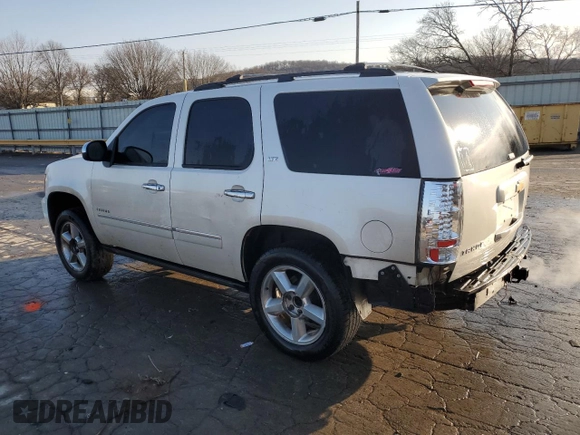 2012 Chevrolet Tahoe LTZ с VIN 1GNSCCE08CR210296, выставлен на аукционе Copart как лот 42102565 с пробегом 193 473 миль миль и Списание • Salvage title. История ставок и продаж доступна на DreamBid. Изображение 2.