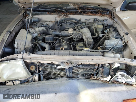 1998 Toyota Tacoma z VIN 4TANL42N8WZ059178, wystawiony jako Copart lot #60350055 z przebiegiem 247 654 mil mil oraz Czysty tytuł • Clean title. Historia ofert i sprzedaży dostępna na DreamBid. Obrazek 11.
