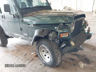2000 Jeep Wrangler Sport with VIN 1J4FA49S8YP780104, listed as a IAAI auction lot 42095731 with Not provided miles and . Bid and sale history available at DreamBid. Image 15.