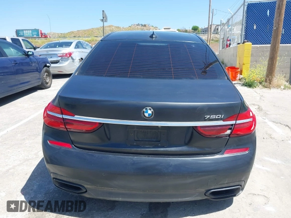 2018 BMW 7 Series 750i with VIN WBA7F0C51JGM23504, listed as a IAAI auction lot 39379378 with 82,251 mi miles. Bid and sale history available at carsss.com. Image 17.