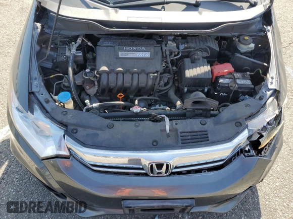2012 Honda Insight EX z VIN JHMZE2H77CS002907, wystawiony jako Copart lot #52040465 z przebiegiem 158 266 mil mil oraz Szkoda całkowita • Salvage title. Historia ofert i sprzedaży dostępna na DreamBid. Obrazek 12.