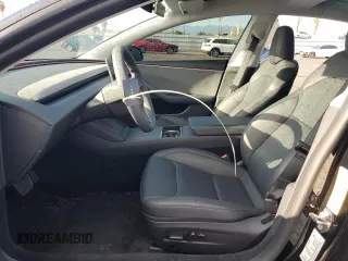 2024 Tesla Model 3 with VIN 5YJ3E1EA5RF738574, listed as a Copart auction lot 48425325 with 9,423 mi miles and Salvage Title. Bid and sale history available at DreamBid. Image 7.