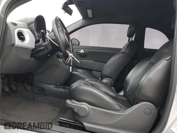 2012 FIAT 500 Sport with VIN 3C3CFFBRXCT385475, listed as a Copart auction lot 60477675 with 131,410 mi miles and Salvage title. Bid and sale history available at DreamBid. Image 7.