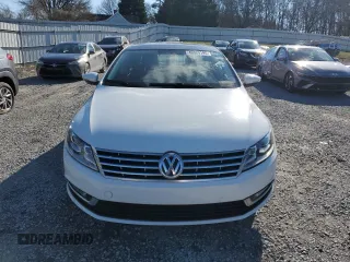 2014 Volkswagen CC Lux with VIN WVWRN7AN1EE506295, listed as a Copart auction lot 46024195 with 143,535 mi miles and Clean Title. Bid and sale history available at carsss.com. Image 5.