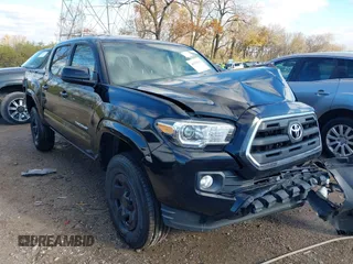 2016 Toyota Tacoma SR with VIN 3TMCZ5AN4GM018454, listed as a IAAI auction lot 40795565 with 109,687 mi miles. Bid and sale history available at carsss.com. Image 1.