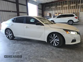 2020 Nissan Altima SR with VIN 1N4AL4CV8LC151610, listed as a Copart auction lot 82953194 with 104,357 mi miles and Clean Title. Bid and sale history available at carsss.com. Image 4.