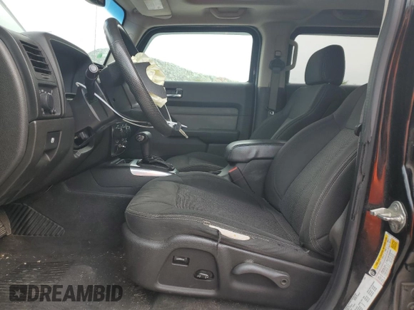 2009 Hummer H3 with VIN 5GNEN13L198138745, listed as a Copart auction lot 63202914 with 168,076 mi miles and Salvage Title. Bid and sale history available at DreamBid. Image 7.