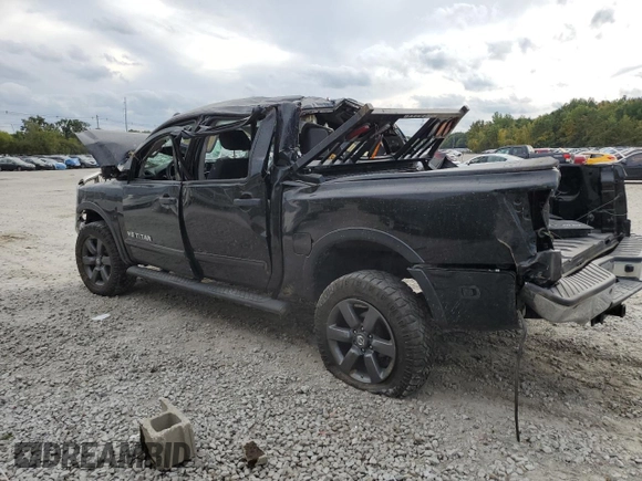 2015 Nissan Titan SL with VIN 1N6AA0EC5FN506114, listed as a Copart auction lot 74430454 with Not Provided miles and Salvage Title. Bid and sale history available at carsss.com. Image 2.
