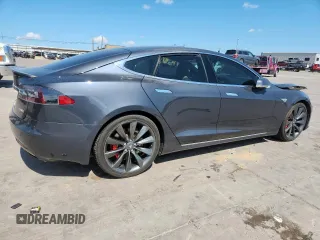 2016 Tesla Model S 90D z VIN 5YJSA1E40GF145137, wystawiony jako Copart lot #62027605 z przebiegiem 92 060 mil mil oraz Szkoda całkowita • Salvage title. Historia ofert i sprzedaży dostępna na DreamBid. Obrazek 3.