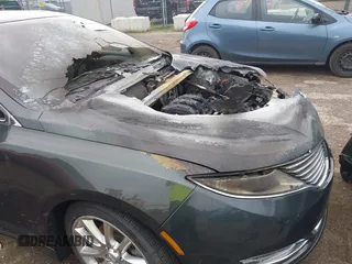 2016 Lincoln MKZ z VIN 3LN6L2GK4GR605486, wystawiony jako IAAI lot #42609084 z przebiegiem Nie podano mil oraz . Historia ofert i sprzedaży dostępna na DreamBid. Obrazek 12.