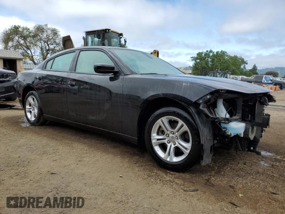 2022 Dodge Charger SXT with VIN 2C3CDXBGXNH200640, listed as a Copart auction lot 54198465 with 72,022 mi miles and Clean Title. Bid and sale history available at DreamBid. Image 4.