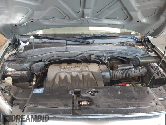2006 Honda Pilot EX-L with VIN 5FNYF187X6B026463, listed as a IAAI auction lot 41612181 with 242,828 mi miles and . Bid and sale history available at DreamBid. Image 10.