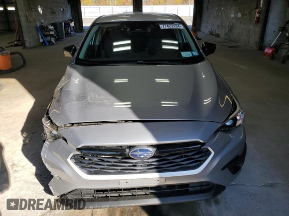 2024 Subaru Impreza with VIN JF1GUABC0R8285271, listed as a Copart auction lot 77423134 with 10,700 mi miles and Salvage Title. Bid and sale history available at carsss.com. Image 5.