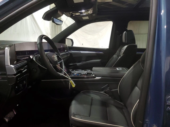 2025 Cadillac Escalade z VIN 1GYS9PRLXSR129201, wystawiony jako Copart lot #59422345 z przebiegiem 775 mil mil oraz Szkoda całkowita • Salvage title. Historia ofert i sprzedaży dostępna na DreamBid. Obrazek 7.