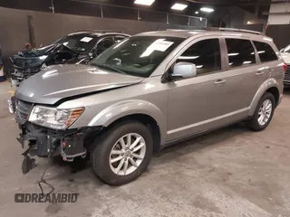 2017 Dodge Journey SXT z VIN 3C4PDCBG8HT589750, wystawiony jako IAAI lot #42286485 z przebiegiem 160 859 mil mil oraz . Historia ofert i sprzedaży dostępna na DreamBid. Obrazek 2.