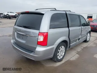 2014 Chrysler Town & Country Touring with VIN 2C4RC1BG0ER234277, listed as a IAAI auction lot 41441067 with 94,314 mi miles. Bid and sale history available at carsss.com. Image 4.