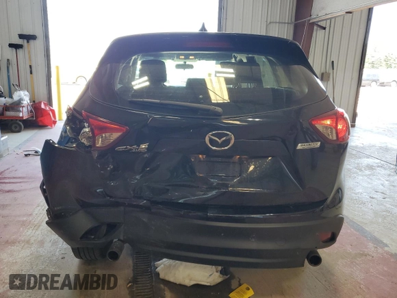 2016 Mazda CX-5 Sport with VIN JM3KE4BY1G0870166, listed as a Copart auction lot 60433035 with 93,433 mi miles and Salvage title. Bid and sale history available at DreamBid. Image 6.