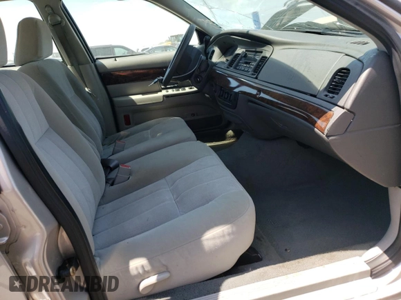 2005 Mercury Grand Marquis GS z VIN 2MEFM74W75X609454, wystawiony jako Copart lot #53794905 z przebiegiem 65 441 mil mil oraz Szkoda całkowita • Salvage title. Historia ofert i sprzedaży dostępna na DreamBid. Obrazek 7.