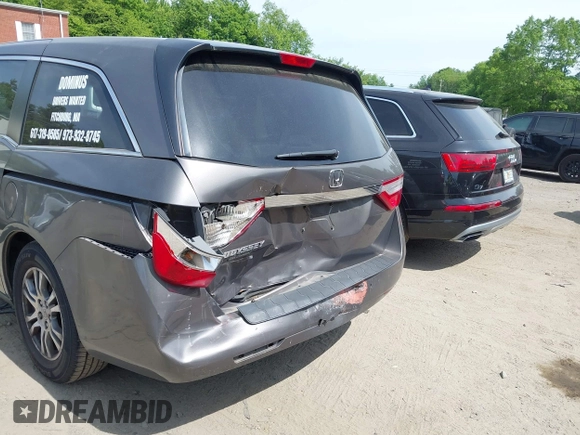 2012 Honda Odyssey EX-L with VIN 5FNRL5H63CB037697, listed as a IAAI auction lot 42262596 with 135,218 mi miles and . Bid and sale history available at DreamBid. Image 6.