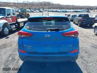 2017 Hyundai Tucson SE Plus with VIN KM8J3CA4XHU315340, listed as a IAAI auction lot 41857937 with 83,957 mi miles. Bid and sale history available at carsss.com. Image 16.