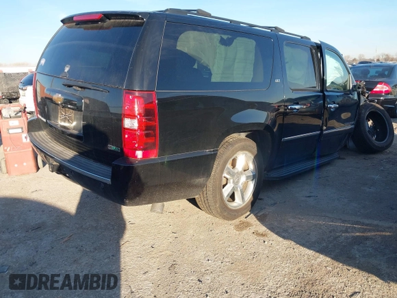 2012 Chevrolet Suburban LTZ with VIN 1GNSKKE75CR133445, listed as a IAAI auction lot 41590306 with 203,592 mi miles. Bid and sale history available at carsss.com. Image 4.