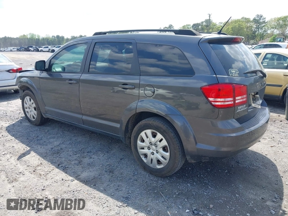2017 Dodge Journey SE with VIN 3C4PDCABXHT538885, listed as a IAAI auction lot 41919599 with 170,311 mi miles and . Bid and sale history available at DreamBid. Image 3.
