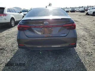 2019 Toyota Avalon Limited Hybrid z VIN 4T1B21FBXKU003688, wystawiony jako Copart lot #69697502 z przebiegiem 48 950 mil mil oraz . Historia ofert i sprzedaży dostępna na DreamBid. Obrazek 6.