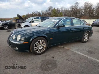 2003 Jaguar S-Type with VIN SAJEA01U03HM72355, listed as a Copart auction lot 87175714 with 99,724 mi miles and Clean Title. Bid and sale history available at DreamBid. Image 1.
