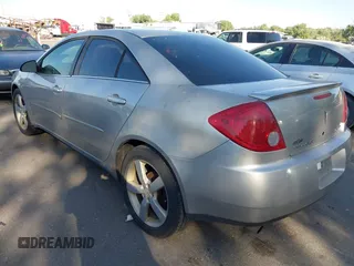 2006 Pontiac G6 GTP with VIN 1G2ZM551064133597, listed as a IAAI auction lot 42383557 with 240,918 mi miles and . Bid and sale history available at DreamBid. Image 3.