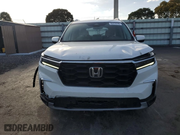 2024 Honda Pilot Touring с VIN 5FNYG2H76RB008887, выставлен на аукционе Copart как лот 46479745 с пробегом 12 947 миль миль и Списание • Salvage title. История ставок и продаж доступна на DreamBid. Изображение 5.
