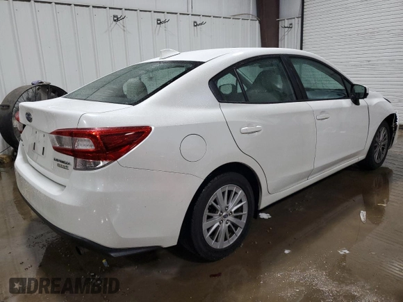 2017 Subaru Impreza Premium z VIN 4S3GKAD66H3604045, wystawiony jako Copart lot #59871325 z przebiegiem 52 071 mil mil oraz Szkoda całkowita • Salvage title. Historia ofert i sprzedaży dostępna na DreamBid. Obrazek 3.