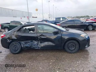 2015 Toyota Corolla L with VIN 5YFBURHE1FP352715, listed as a IAAI auction lot 41696284 with 121,906 mi miles and . Bid and sale history available at DreamBid. Image 13.