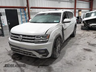 2019 Volkswagen Atlas SE z VIN 1V2XR2CA0KC595596, wystawiony jako IAAI lot #41410019 z przebiegiem 103 336 mil mil oraz . Historia ofert i sprzedaży dostępna na DreamBid. Obrazek 18.