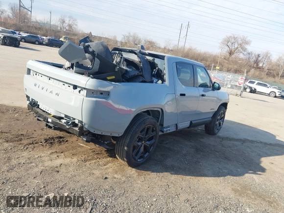 2025 Rivian R1T Adventure z VIN 7FCTGBAAXSN035740, wystawiony jako IAAI lot #41728515 z przebiegiem 3 773 mil mil oraz . Historia ofert i sprzedaży dostępna na DreamBid. Obrazek 4.