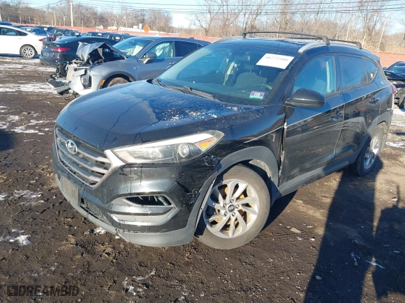 2016 Hyundai Tucson SE with VIN KM8J3CA42GU076476, listed as a IAAI auction lot 41272580 with 112,010 mi miles. Bid and sale history available at carsss.com. Image 2.