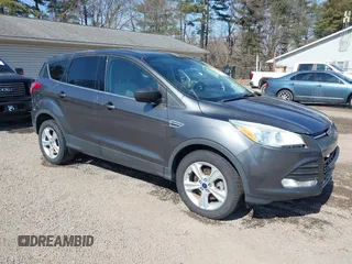 2015 Ford Escape SE with VIN 1FMCU9GX1FUC19376, listed as a IAAI auction lot 41769390 with 98,334 mi miles. Bid and sale history available at carsss.com. Image 1.