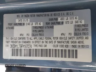 2015 Mazda 3 i Touring with VIN 3MZBM1L79FM187074, listed as a IAAI auction lot 42147375 with 23,394 mi miles and . Bid and sale history available at DreamBid. Image 9.
